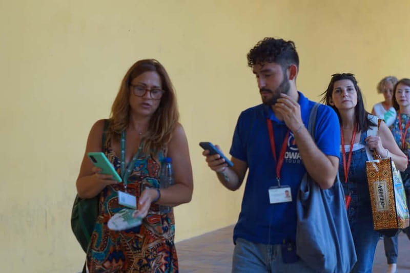 From Madrid: Cordoba and Mosque Day Trip by High-Speed Train - Walking across the Roman Bridge and into the old city