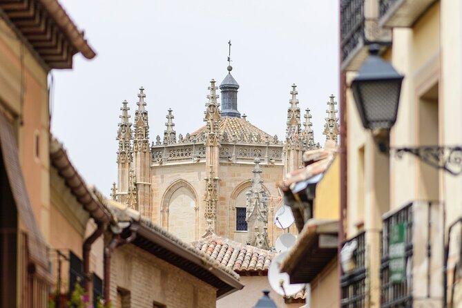 From Madrid: Full-Day Medieval Tour in Toledo and Ávila - Ávila Cathedral inside the city walls