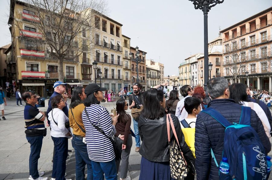 From Madrid: Toledo Tour with Wine Tasting and 3 Monuments - Walking through Toledo with a bilingual guide