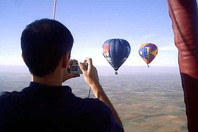 Hot-Air Balloon Ride over Aranjuez with Optional Transport from Madrid - Takeoff and landing are part of the story
