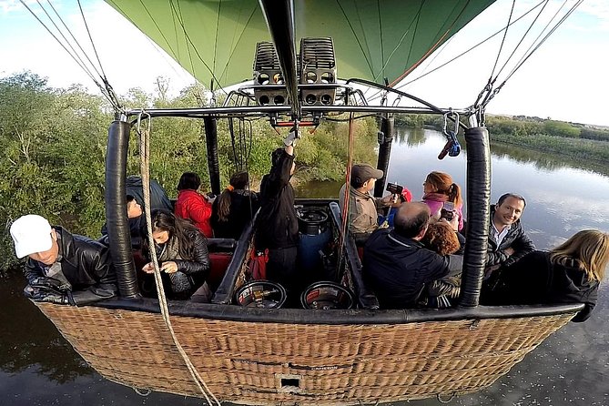 Hot-Air Balloon Ride over Toledo with Optional Transport from Madrid - Launching at La Peraleda near the river