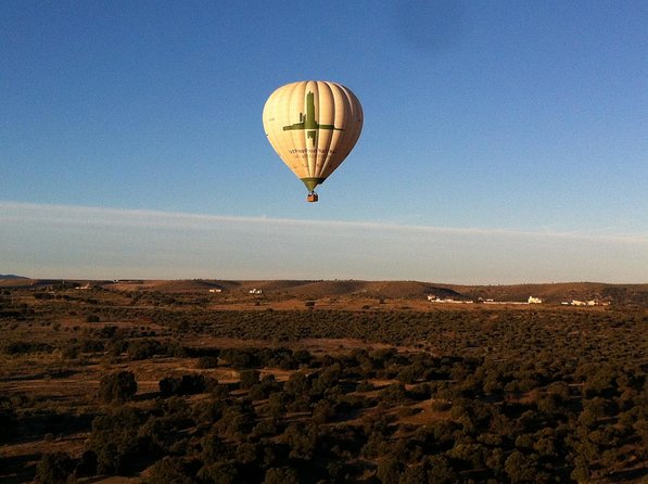 Hot-Air Balloon Ride over Toledo with Optional Transport from Madrid - Landing, helping with the balloon, and the meal afterward