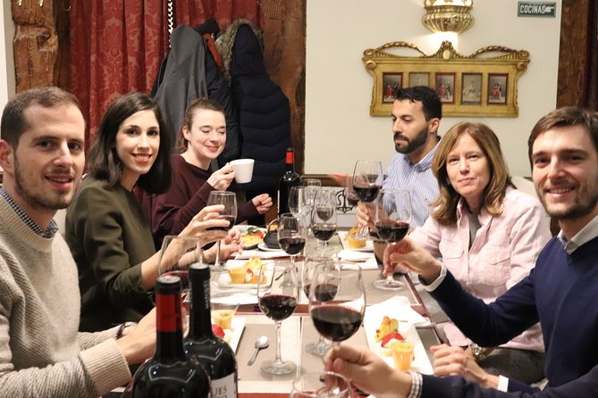 Iberian Ham and Wine Small Group Tour in Madrid - The first stop: classic tapas and two wines