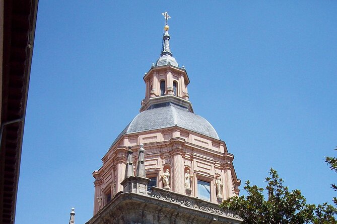 La Latina to Madrid Guided Tour with Breakfast - Galería Canalejas and the changing center of Madrid