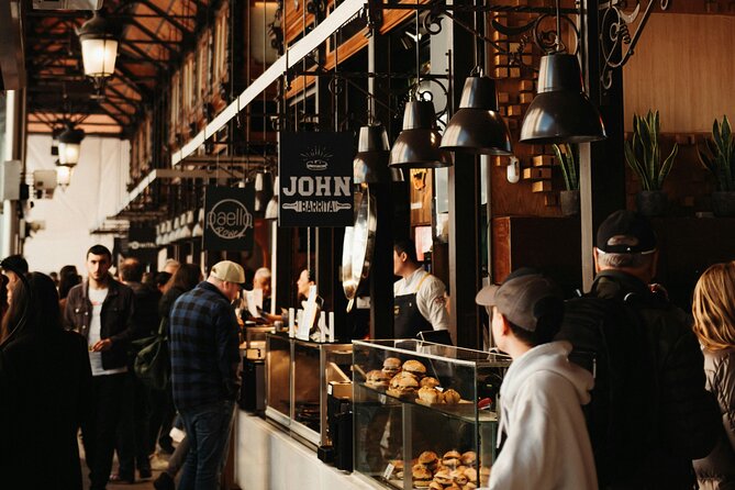 Local Tapas, Beer and Wine Tour of Madrid All Inclusive - Walking through Sol between bites