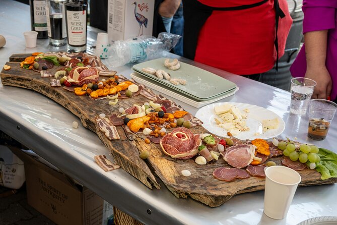Local Tapas, Beer and Wine Tour of Madrid All Inclusive - The squid sandwich at Plaza Mayor