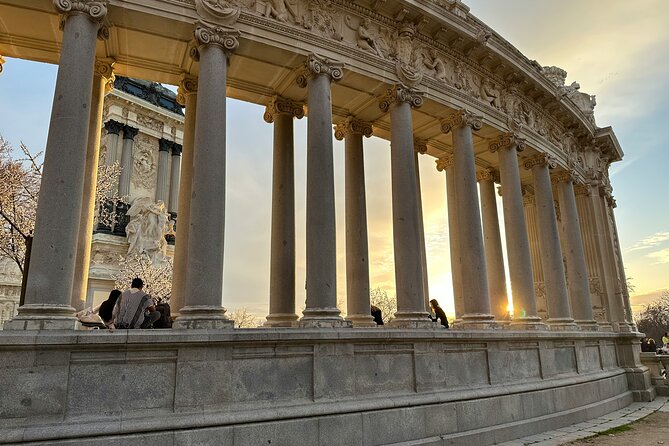 Madrid Bike Tour with Churros and Wine, Ham, and Cheese Upgrade - The Prado district and two famous fountains