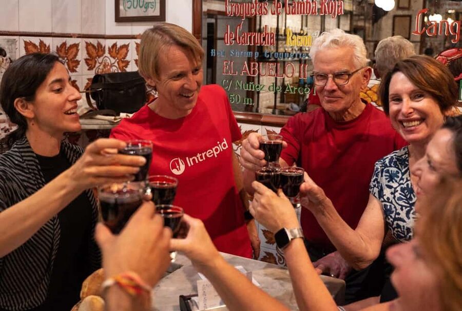 Madrid: Evening Tapas Tour with 5 Delicious Stops & Drinks - Mercado de San Miguel: famous, central, and busy