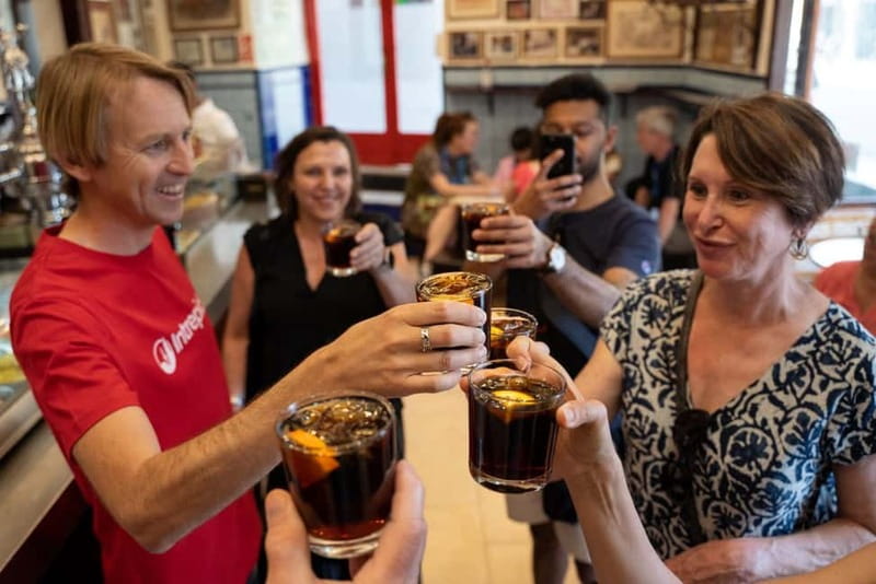 Madrid: Evening Tapas Tour with 5 Delicious Stops & Drinks - Plaza Mayor and the bocadillo de calamares