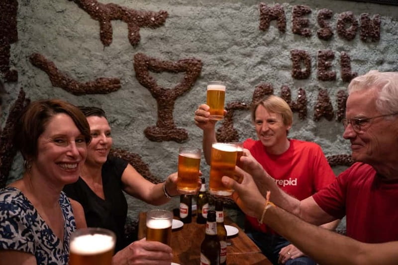 Madrid: Evening Tapas Tour with 5 Delicious Stops & Drinks - Shrimp, wine, and the final sweet course