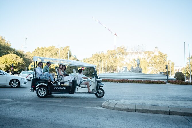 Madrid Express Tour with Local Guide in Eco Tuk Tuk Private - What the electric tuk tuk feels like