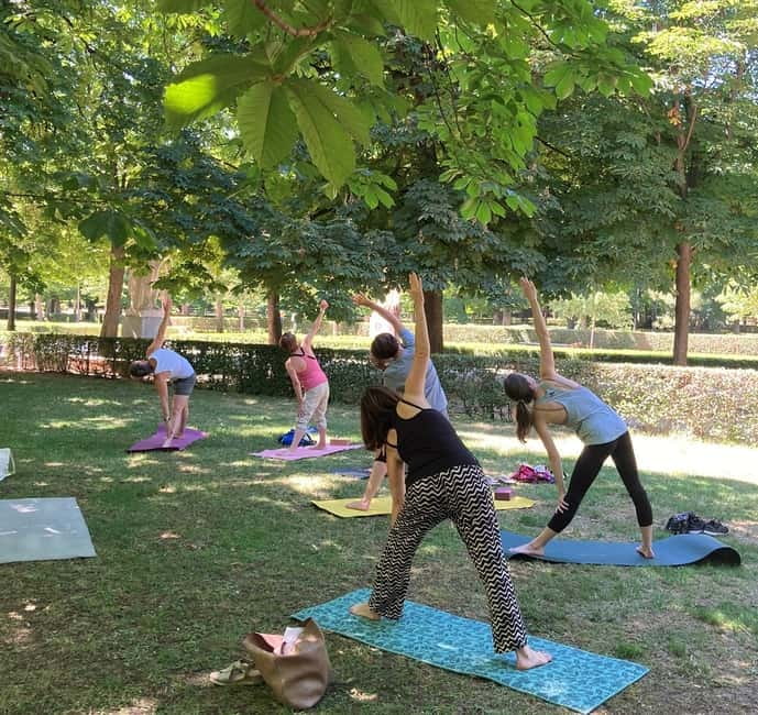Madrid: Flow Yoga class in Retiro Park - Booking and Cancellation Details