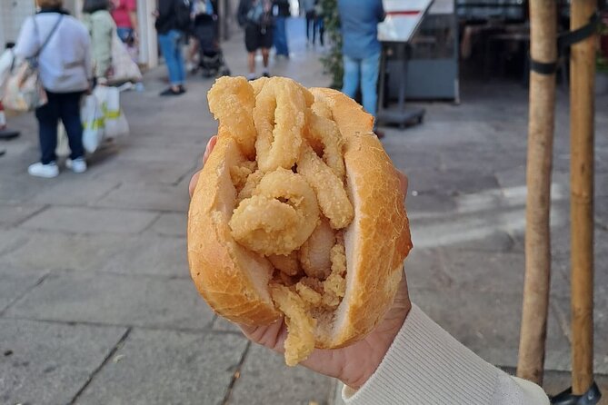 Madrid Food Tour: Tapas, Drinks and Delights with a Local - Plaza Mayor and Madrid’s calamari sandwich