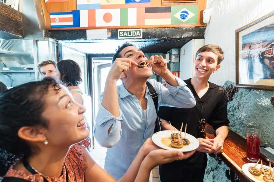 Madrid: Food Walking Tour with Drink and Local Guide - Four stops, from familiar tapas to newer ideas