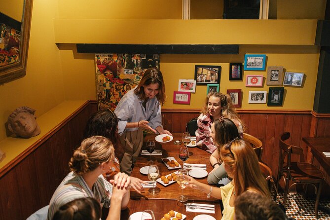Madrid Food Walking Tour with Tapas and Vermouth - The squid-ink calamari sandwich on Calle de Toledo