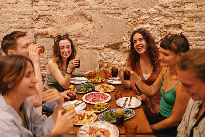 Madrid Food Walking Tour with Tapas and Vermouth - Tortilla, goat cheese, and a local beer