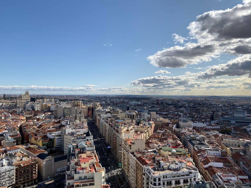 Madrid: Gran Vía Rooftops and Architecture Tour - Metropolis and the opening stretch of Gran Vía