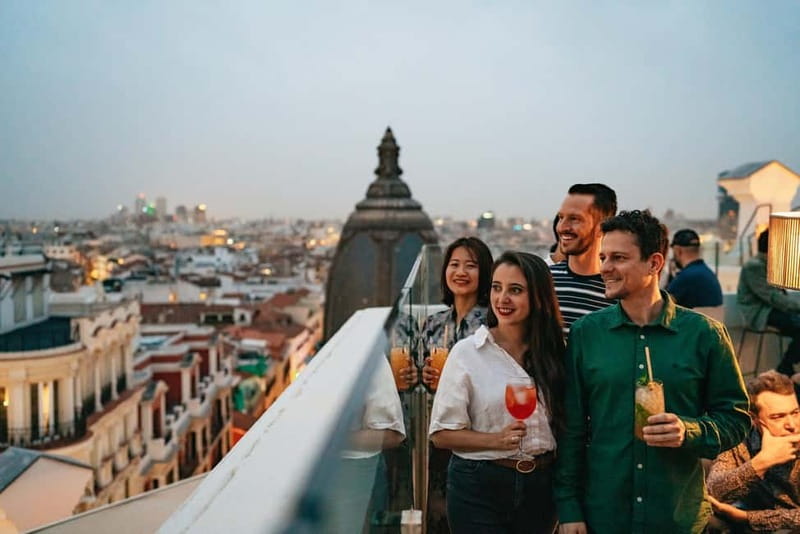 Madrid: Guided Tapas and Wine Tour with Terrace Visit - Iberian ham, sausages, and Spanish wine
