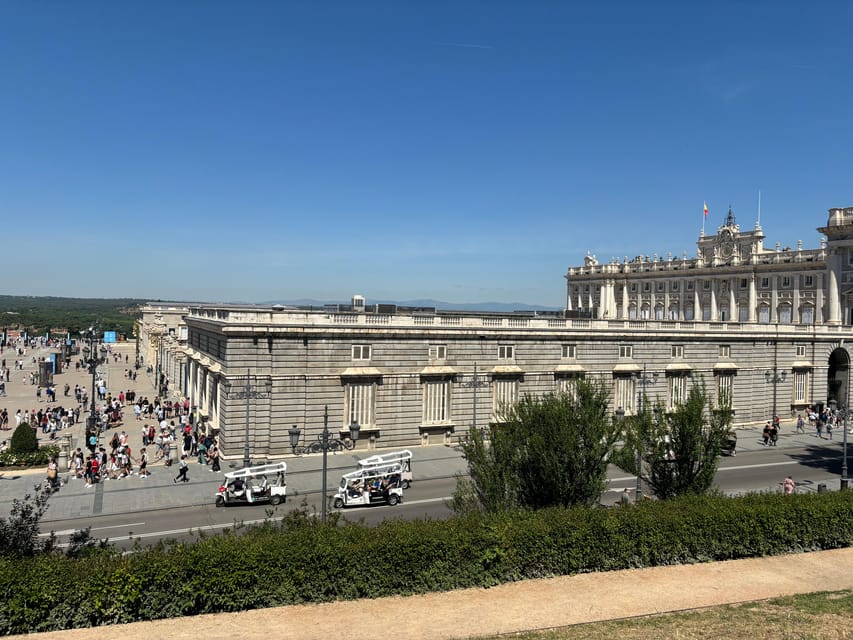 Madrid: Hidden Gems and Secrets Small Group Walking Tour - A cathedral, an old wall, and a garden