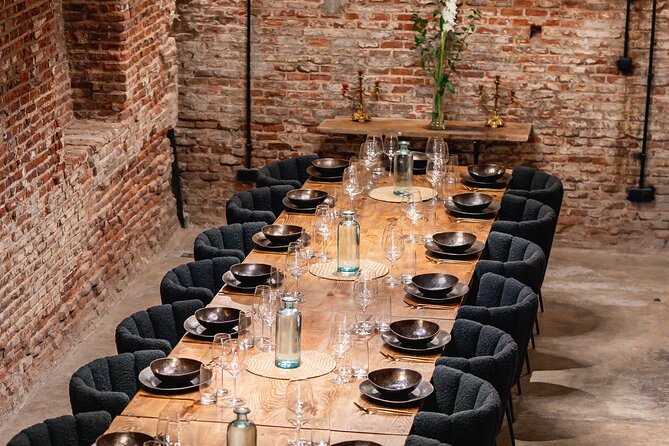 Madrid Local Tapas Tour with Private Dinner and Bottomless Wine - Iberian ham in a former Museo del Jamón