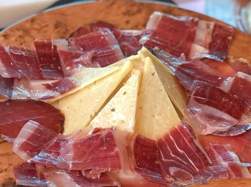 Madrid: Los Porches Flamenco Show with Tapas and Wine Ticket - Tapas and wine: the part that needs careful reading