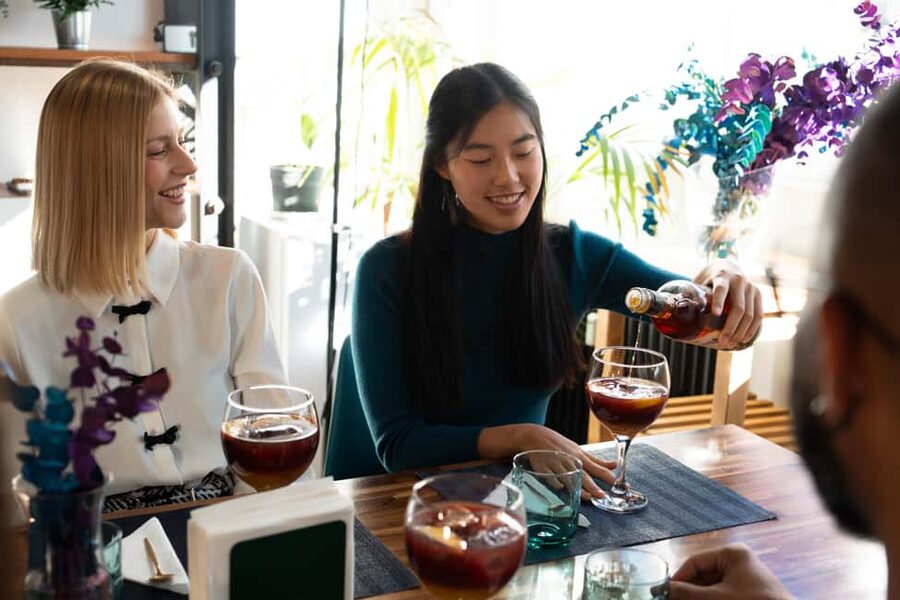 Madrid: Paella and Sangria Workshop with Tapas - Sitting down to eat what you made