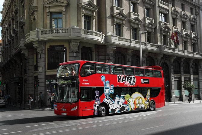 Madrid Panoramic City Bus Tour - The included walking tour and extra voucher