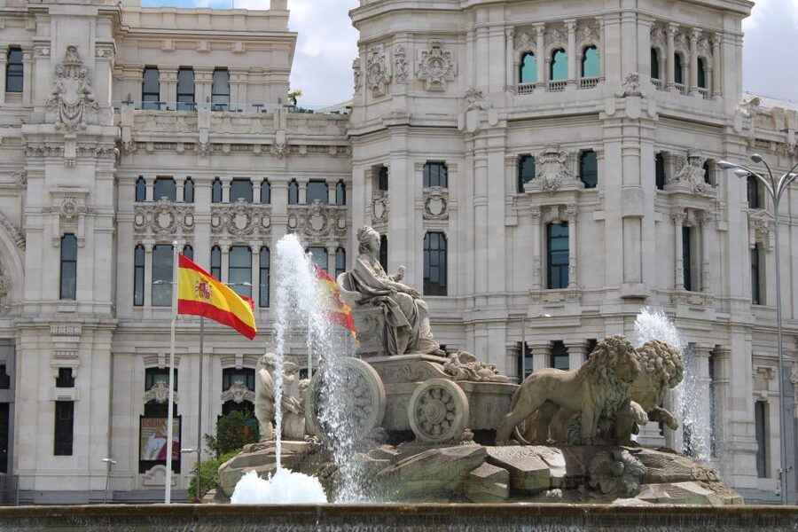 Madrid: Panoramic Open-Top Bus Day or Night Tour with Guide - The guide, sound, and bilingual format