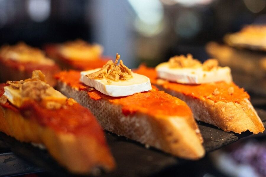 Madrid: Private Food Tour – 10 Tastings with Locals - Three tapas places and plenty of food