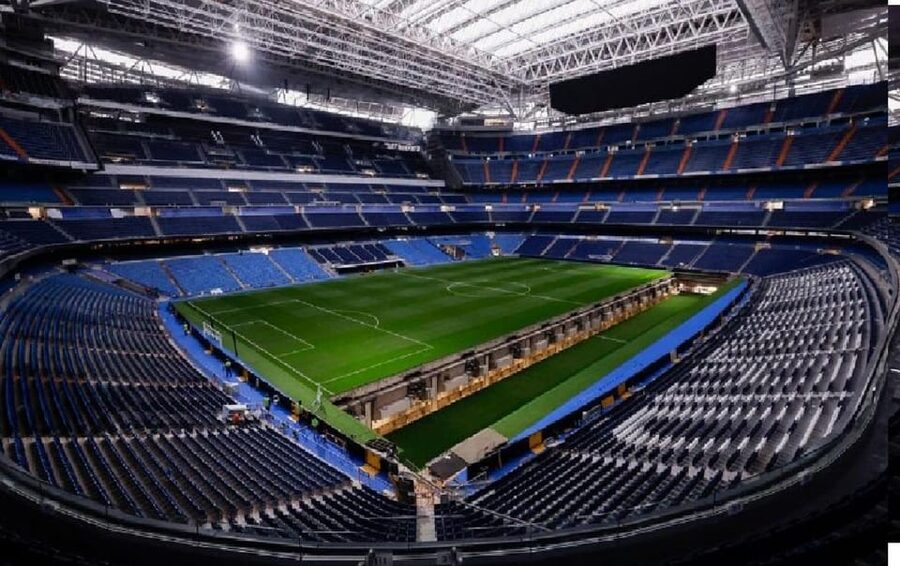 Madrid: Private Guided Tour of Bernabéu Stadium - The pitch view from the seating area