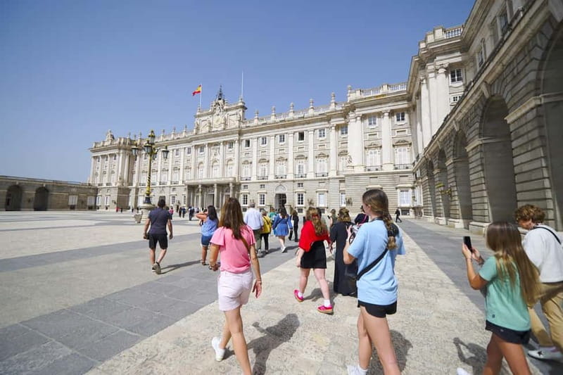 Madrid: Royal Palace Expert Guided Tour with Skip-the-Line - Meeting at Opera and walking through Plaza de Oriente