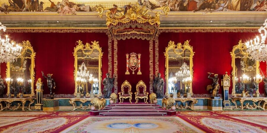 Madrid: Royal Palace Guided Tour with Entry Ticket - The royal collections: violins, crown, and armory