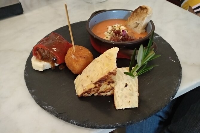 Madrid Small Group Tapas Tour at 4 Venues -Lunch or Dinner - The second stop brings broth, bread, and hearty tapas