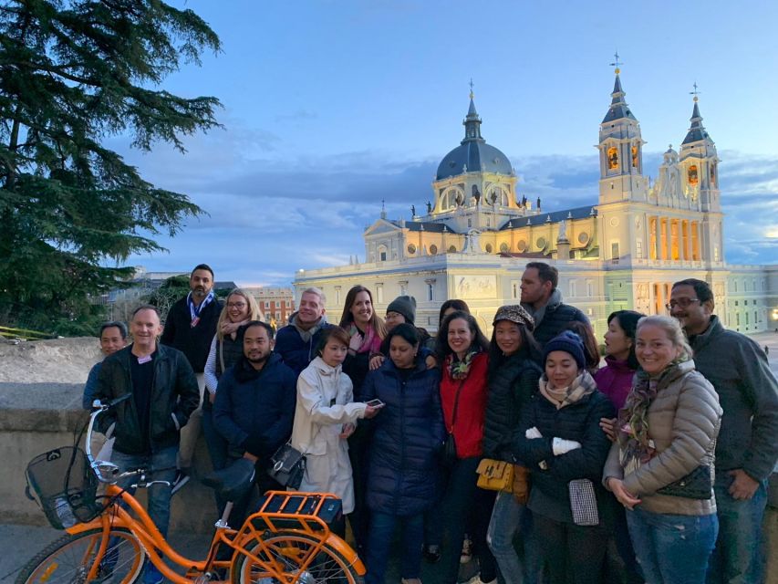 Madrid: Sunset and Night Lights Bike Tour - Starting near Calle Santiago and entering old Madrid