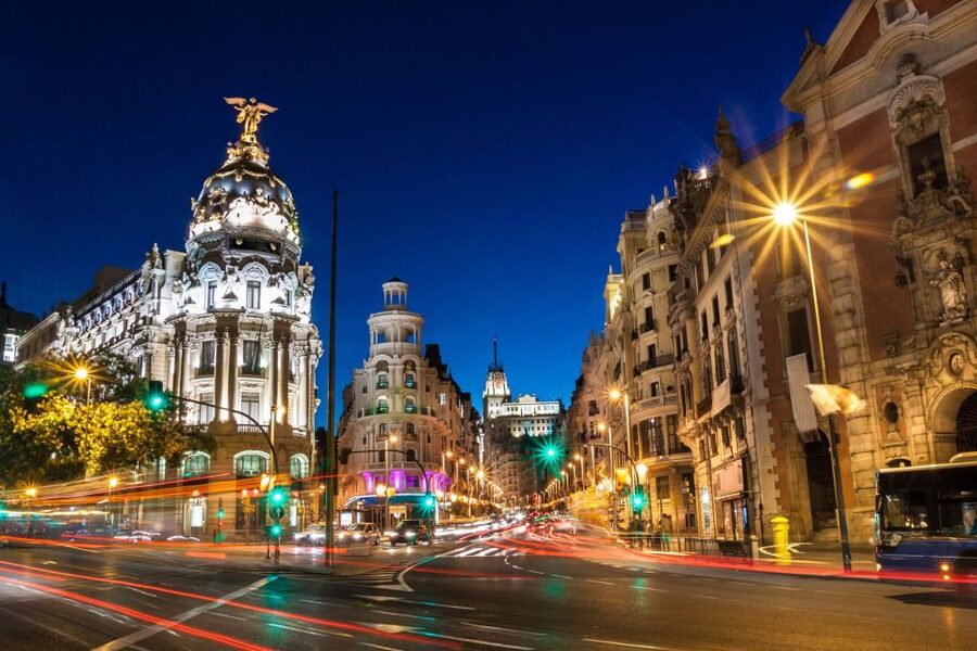 Madrid: Sunset Walking Tour with Optional Flamenco Show - The Royal Palace exterior at sunset