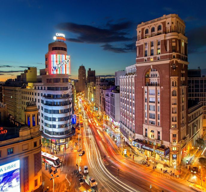 Madrid: Sunset Walking Tour with Optional Flamenco Show - From the Isabel II statue into El Madrid de los Austrias