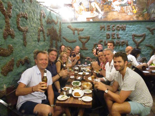 Madrid Tapas & Drinks: A Small Group Culinary Adventure - Mushrooms, squid sandwiches, and the oldest restaurant