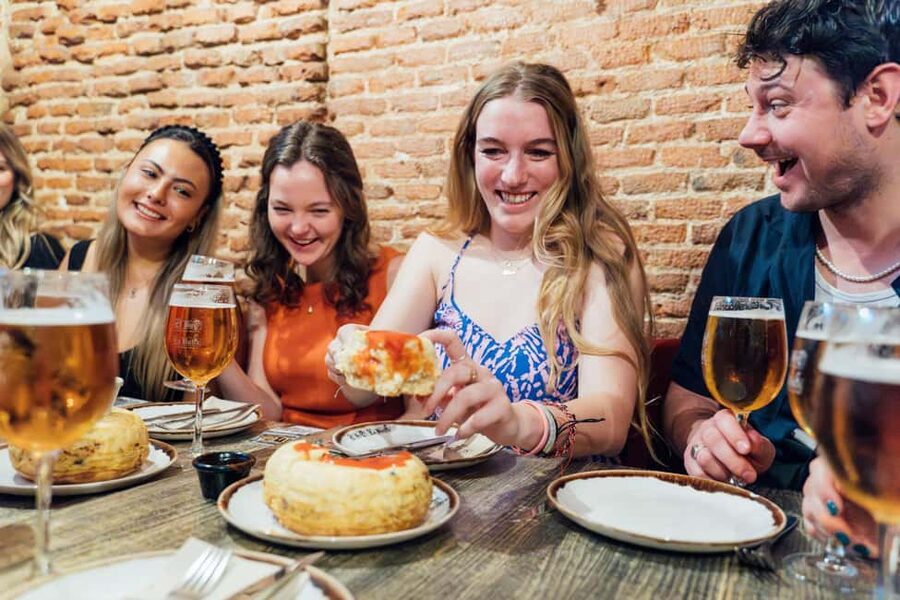 Madrid: Tapas Food Crawl with 6 Tapas and 4 Drinks - Spanish wine and vermouth with the food