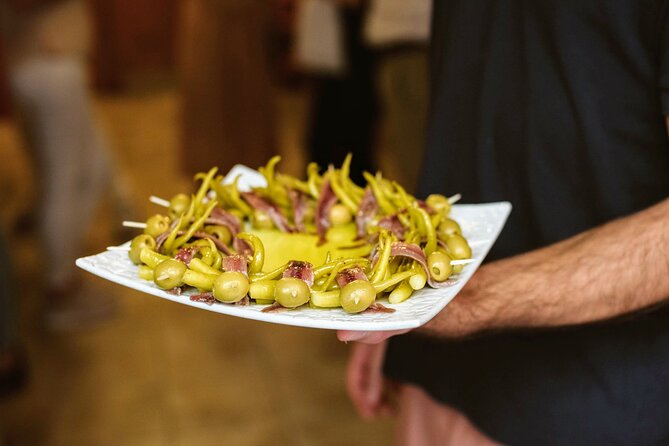 Madrid Tapas & Paella Cooking Experience with Local Market Visit - Who should book this Madrid cooking experience?