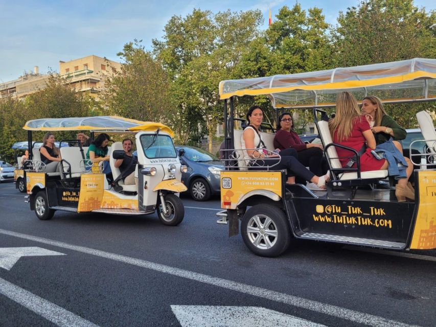 Madrid: Traditional Tour wh Private guide in yellow Tuk Tuk - Plaza Colón, Calle Alcalá, and the Metrópolis building