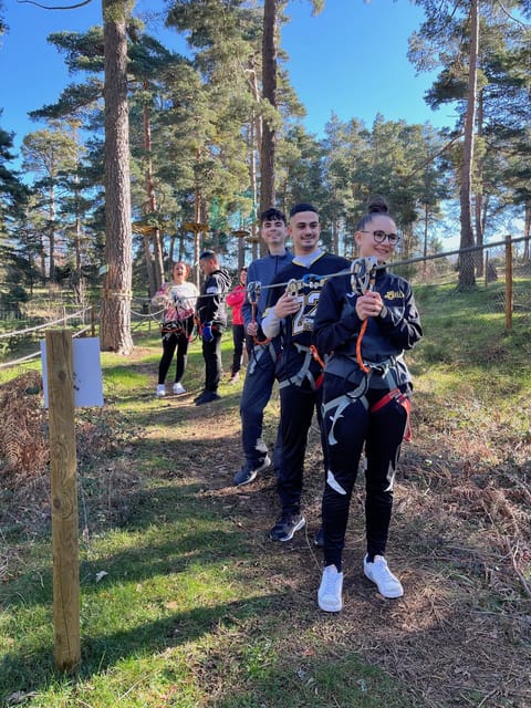 Madrid: Zip line circuits high in the trees - Friendly help when a challenge feels awkward