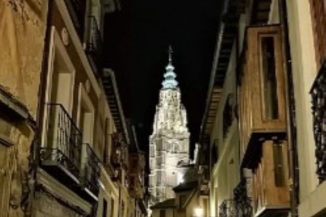 Night Walking Tour of Toledo to learn about Secrets and Legends - The cathedral clock gate and another Béquer tale
