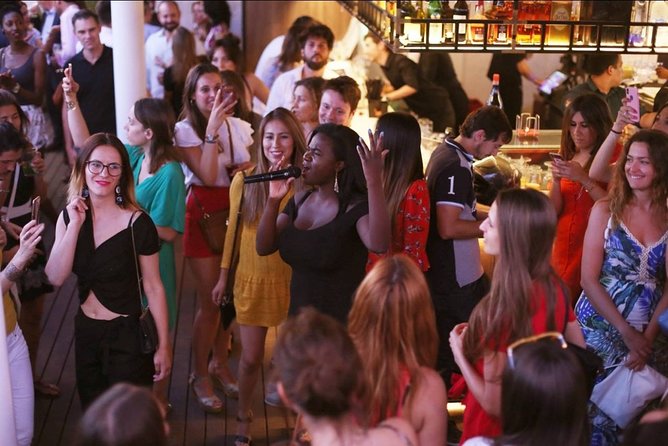 Nightlife Tour Drinks Tapas and Party Experience in Madrid - Walking Calle de la Montera with a local guide