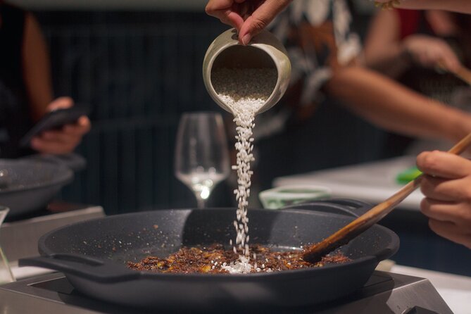 Paella Cooking Class in Madrid with Bottomless Wine Pairing - A lively class rather than a quiet lesson