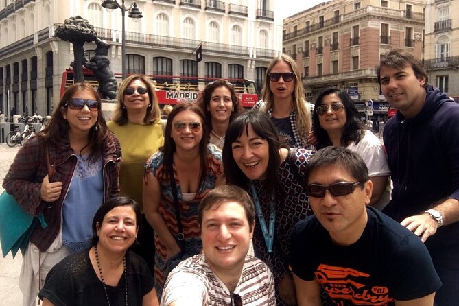 Private Half-Day Guided Tour of Madrid: 2H by private vehicle & 2H walking - Puerta del Sol and Madrid’s zero kilometer