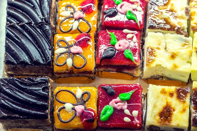 Private: Madrid Historic Centre Food Tour with 10+ Authentic - Puerta del Sol to San Ginés after dark