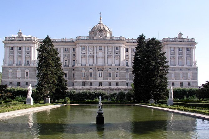 Royal Palace Guided Tour Small Group with Tickets - The short walk toward the Prado