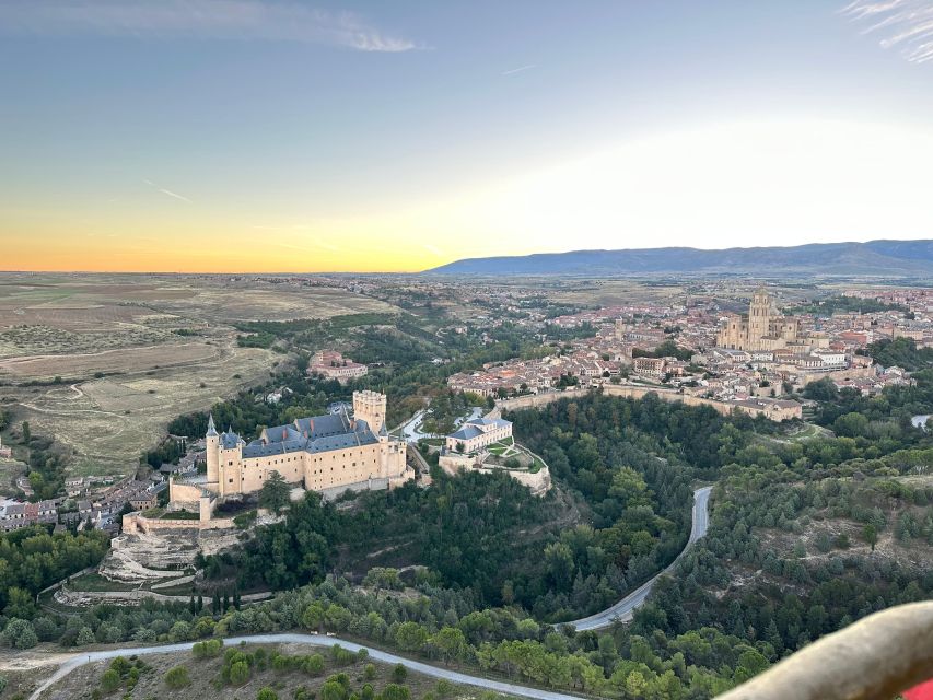 Segovia: Hot-air balloon ride with cava toast & picnic - From hotel pickup to the launch area