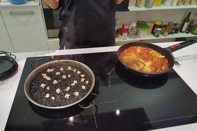 Spanish Tapas & Paella Cooking Class in Central Madrid with Lola - Sitting down to eat what you made