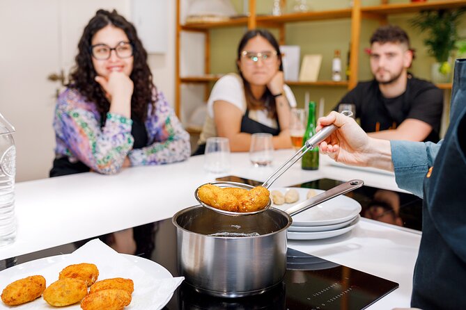 Tapas & Paella Cooking Class in Madrid with a Professional Chef - Ajoarriero cod adds a northern Spanish note
